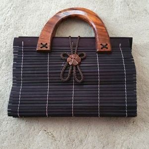 Black wooden purse with wooden handles